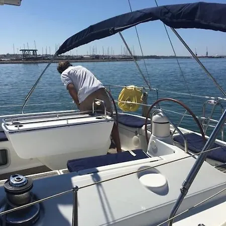 Sailing Yacht In Marina *